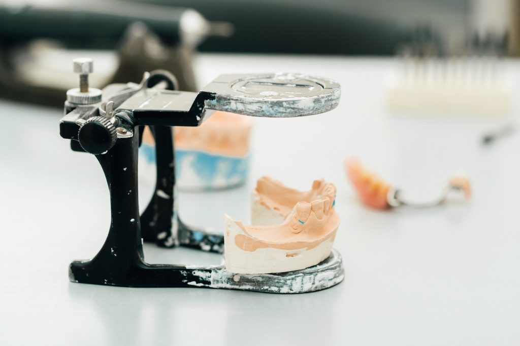 Dental laboratories collaborate closely with clinicians to design and produce custom orthodontic appliances and splints.